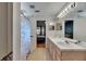 Full bathroom featuring a double sink vanity, and a shower/tub combo at 221 Lakeway Ln, Apollo Beach, FL 33572