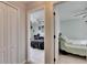 View of two bedrooms, each with ceiling fans and ample natural light at 221 Lakeway Ln, Apollo Beach, FL 33572