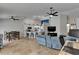 Open living and dining area with recessed lighting, tile flooring, and ceiling fans at 221 Lakeway Ln, Apollo Beach, FL 33572