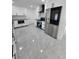 Modern kitchen featuring stainless steel appliances and white cabinets at 2528 Columbus S Way, St Petersburg, FL 33712