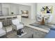 Bright, open-concept living area featuring a dining space and comfortable seating at 2528 Columbus S Way, St Petersburg, FL 33712