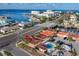Stunning aerial view of waterfront property with a private pool, dock and convenient road access at 2600 N Paula Dr # 2B, Dunedin, FL 34698