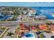 Aerial view showing the property's pool and proximity to Dunedin Causeway, and nearby water access at 2600 N Paula Dr # 2B, Dunedin, FL 34698