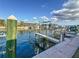 Waterfront view of community boat slips, showing convenient water access for residents and boaters at 2600 N Paula Dr # 2B, Dunedin, FL 34698