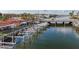 Waterfront property with boat lifts and docks, providing direct access to the open water at 2600 N Paula Dr # 2B, Dunedin, FL 34698