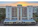 Attractive exterior view of building showing covered parking, balconies, and manicured grounds at 2625 Terra Ceia Bay Blvd # 406, Palmetto, FL 34221