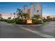 Beautiful exterior view of the entrance to the building showing lush landscaping and signage at 2625 Terra Ceia Bay Blvd # 406, Palmetto, FL 34221