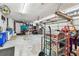 Large garage with storage cabinets, a variety of tools, and plenty of workspace at 2914 Timber Knoll Dr, Valrico, FL 33596