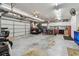 Spacious garage with ample storage space, tool organizers, and bright lighting at 2914 Timber Knoll Dr, Valrico, FL 33596