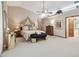 Spacious main bedroom with tray ceiling, neutral tones, and ensuite bathroom at 2914 Timber Knoll Dr, Valrico, FL 33596