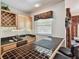 Wet bar offering a tile countertop, wine rack, and seating at 2914 Timber Knoll Dr, Valrico, FL 33596