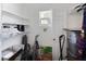 Functional laundry room with ample storage and utility sink at 2964 Catherine Dr, Clearwater, FL 33759
