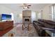 Cozy living room featuring a brick fireplace and modern furnishings at 2964 Catherine Dr, Clearwater, FL 33759