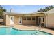 Backyard pool with a patio area, offering a perfect spot for outdoor entertaining and enjoying the water at 2964 Catherine Dr, Clearwater, FL 33759