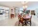 Charming dining room with chandelier and classic wood furniture, perfect for Gathering gatherings at 3168 Masters Dr, Clearwater, FL 33761
