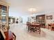 Spacious dining room features tile flooring and ample space for entertaining guests at 3168 Masters Dr, Clearwater, FL 33761