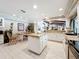 Bright kitchen with an island, white cabinetry, and modern appliances offering an eat-in dining space at 3168 Masters Dr, Clearwater, FL 33761