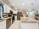 Modern kitchen with stainless steel appliances and granite countertops for a gourmet cooking experience at 3168 Masters Dr, Clearwater, FL 33761