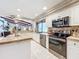 Updated kitchen with stainless steel appliances and stylish finishes offers a contemporary design at 3168 Masters Dr, Clearwater, FL 33761