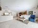 Bright and airy living room with tile floors and neutral colors at 3168 Masters Dr, Clearwater, FL 33761