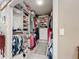 Organized walk-in closet with shelving, hanging rods, and ample storage space at 3168 Masters Dr, Clearwater, FL 33761