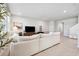 Bright living room with comfortable seating and tile flooring at 31779 Asbury Ave, Wesley Chapel, FL 33545