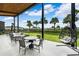 Inviting outdoor patio with comfortable seating and stylish decor, perfect for relaxation and enjoying the views at 31779 Asbury Ave, Wesley Chapel, FL 33545