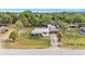 Spacious property featuring a cozy home with a metal roof and carport at 3407 Cason Rd, Plant City, FL 33566