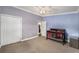 The bedroom features two-toned walls and a ceiling fan with attached closet at 3407 Cason Rd, Plant City, FL 33566
