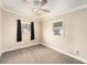 Cozy bedroom with plush carpeting and ample natural light at 3407 Cason Rd, Plant City, FL 33566
