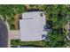 Aerial view of the house showing the roof and surrounding landscaping at 3408 90Th N Ter, Pinellas Park, FL 33782