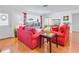 Cozy living room with a view of the front door and a large window at 3408 90Th N Ter, Pinellas Park, FL 33782