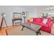 Cozy living room space featuring hardwood floors and ship decor with views to the dining room at 3408 90Th N Ter, Pinellas Park, FL 33782