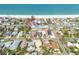 Stunning aerial view of a property with a beach in the background at 3516 Casablanca Ave, St Pete Beach, FL 33706