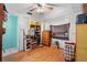 Bedroom with hardwood floors, a closet, and a window for natural light at 38351 7Th Ave, Zephyrhills, FL 33542