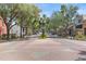 Picturesque street view with shade trees and well-maintained street at 38351 7Th Ave, Zephyrhills, FL 33542