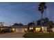 Inviting single-story home showcasing a brick driveway, garage, and lush landscaping at 3981 Mckay Creek Dr, Largo, FL 33770