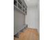 Mudroom with gray storage, shelving, and a bench at 4607 W Lamb Ave, Tampa, FL 33629