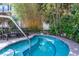 Cozy hot tub surrounded by lush greenery, perfect for relaxing and unwinding after a long day at 504 S Armenia Ave # 1338, Tampa, FL 33609