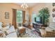 Comfortable living room with a large window, stylish furnishings, and a television at 504 S Armenia Ave # 1338, Tampa, FL 33609