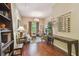 Cozy living room with hardwood floors, chandelier, and comfortable seating area at 504 S Armenia Ave # 1338, Tampa, FL 33609