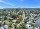 An aerial view showing the property with the Tampa skyline in the distance at 5065 Shore Acres Ne Blvd, St Petersburg, FL 33703
