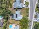 Aerial view of the property showcasing the layout, pool, and surrounding neighborhood at 5065 Shore Acres Ne Blvd, St Petersburg, FL 33703