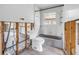 Bathroom featuring a bathtub and toilet, partially prepped for renovation at 5065 Shore Acres Ne Blvd, St Petersburg, FL 33703