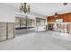 Renovation ready kitchen boasts potential with bright light and view of screened in pool at 5065 Shore Acres Ne Blvd, St Petersburg, FL 33703