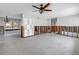 Spacious living room awaiting remodel with ample natural light and neutral tones at 5065 Shore Acres Ne Blvd, St Petersburg, FL 33703