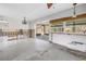 Spacious living room area with view of screened in pool, ready for your personal touch at 5065 Shore Acres Ne Blvd, St Petersburg, FL 33703