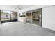 Bright screened in pool area with open view of the backyard at 5065 Shore Acres Ne Blvd, St Petersburg, FL 33703