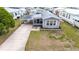 An aerial shot capturing the home's covered parking and neatly kept surroundings at 5428 Joyce St, Zephyrhills, FL 33542