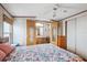 Comfortable main bedroom with an opening to the bathroom, and closet at 5428 Joyce St, Zephyrhills, FL 33542